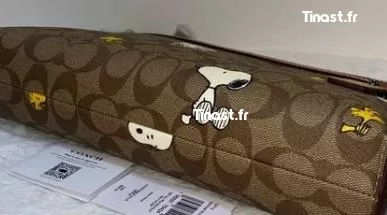 49€ MINI POCHETTE SNOOPY