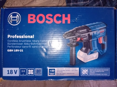 Perforateur Bosch + chargeur + 2 batterie
