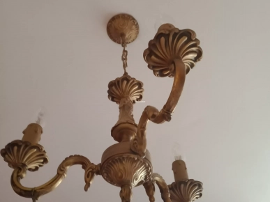 Vends deux lustres en bronze Vends deux lustres en bronze