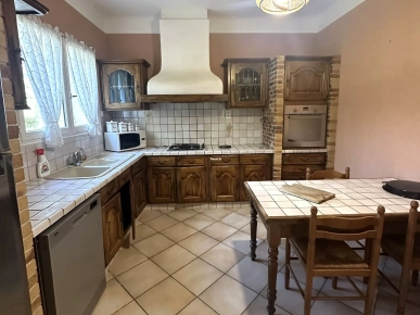 Appartement de type T3 situé au Rez-de-chaussée d'une Villa avec