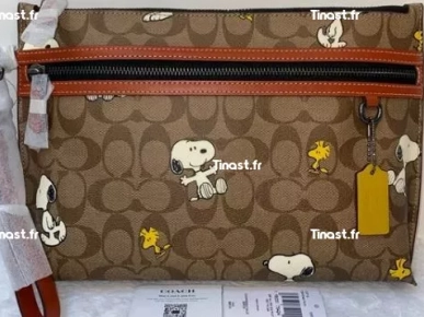 49€ MINI POCHETTE SNOOPY 49€ MINI POCHETTE SNOOPY