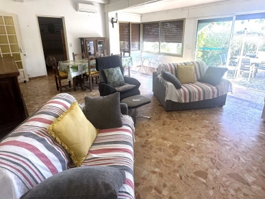 Appartement de type T3 situé au Rez-de-chaussée d'une Villa avec