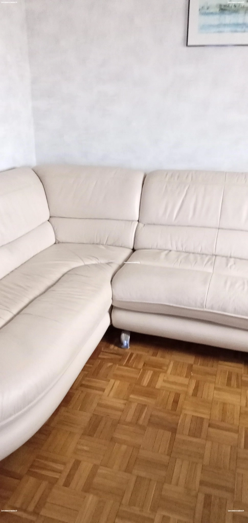 Canapé d'angle avec côté rotatif beige